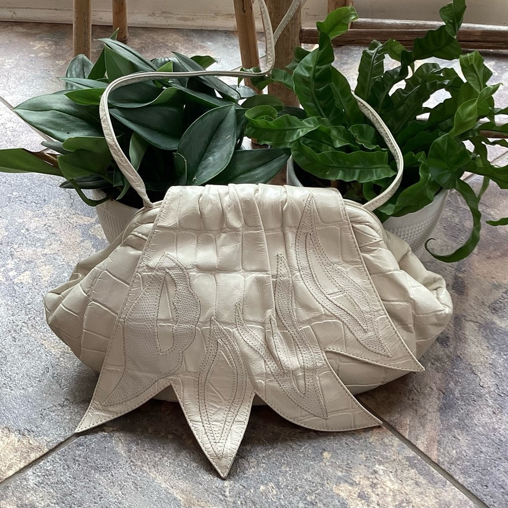 La Bottega leather bag w leather flower flap enclosure